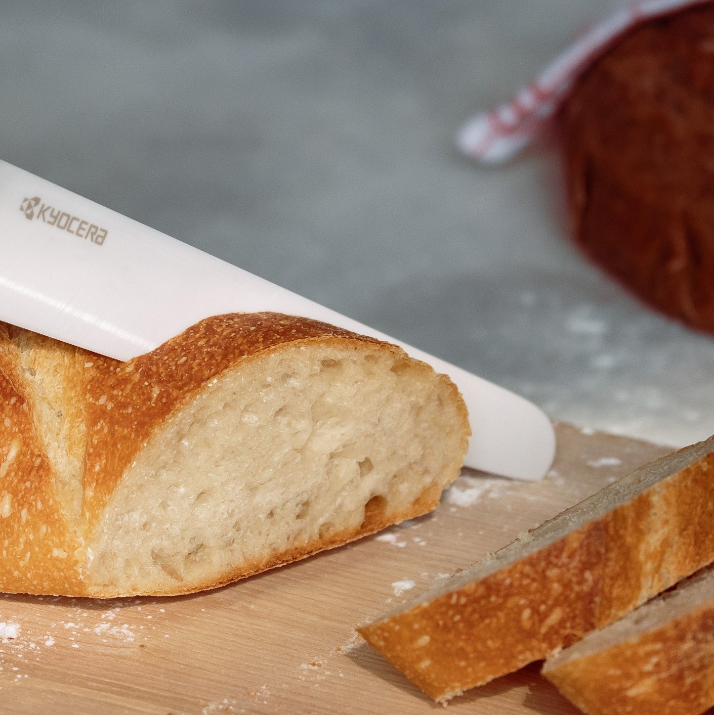 Kyocera INNOVATIONwhite® 7" Ceramic Bread Knife - White Z212 Micro Serrated Blade with Non-Slip Black Handle