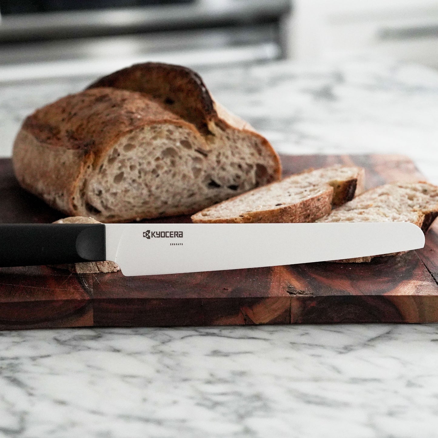 Kyocera INNOVATIONwhite® 7" Ceramic Bread Knife - White Z212 Micro Serrated Blade with Non-Slip Black Handle
